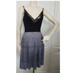 Vintage Stylist Pleated Navy and White Polka dot skirt with pockets